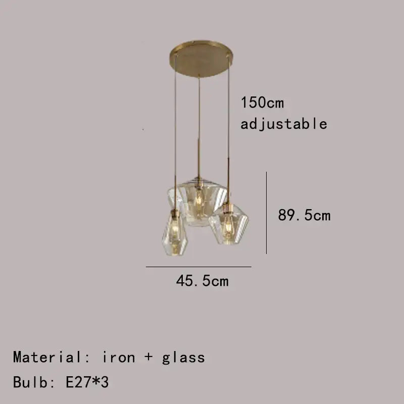 Modern gray amber glass pendant lamp with gold-toned iron and three faceted crystal shades decorbites gray amber decor
