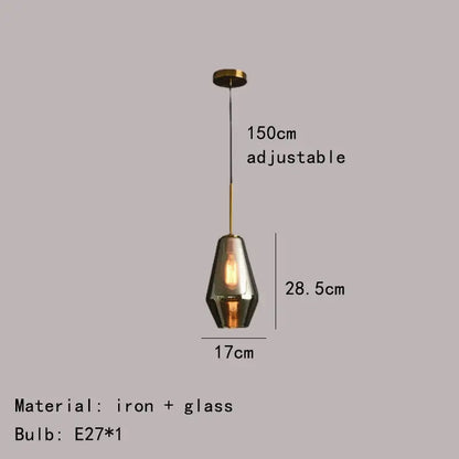 Modern gray amber glass pendant lamp with a sleek geometric shade and brass iron frame for dining room lighting decorbites gray amber