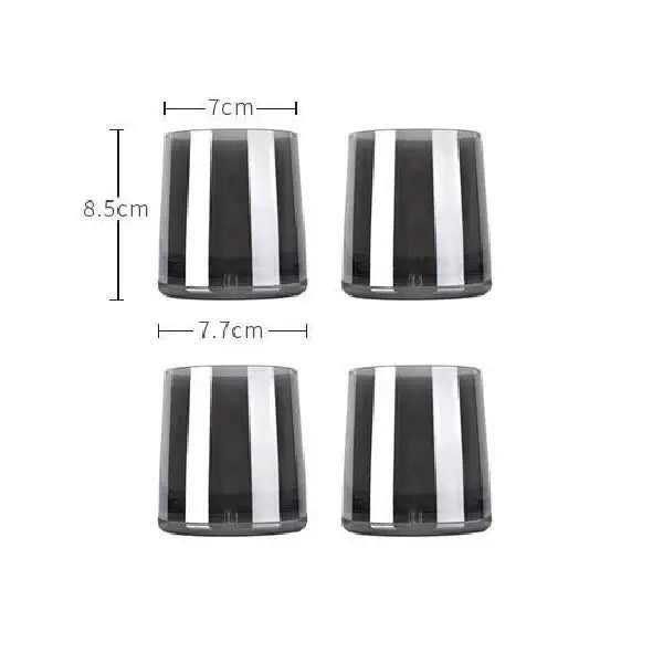 Set of four sleek dark gray amber glass tumblers with bold vertical silver stripes complementing decorbites gray amber pitcher