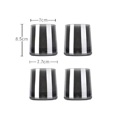 Set of four sleek dark gray amber glass tumblers with bold vertical silver stripes complementing decorbites gray amber pitcher