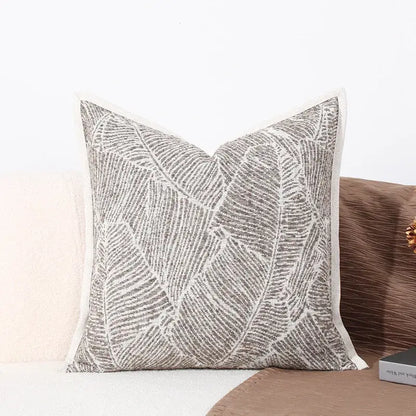 Modern gray and white leaf cushion cover with embroidered pattern and textured fabric for black white sofa decorbites decor