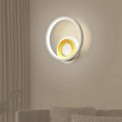 Modern gray and wood double ring wall lamp with sleek circular design and glowing yellow inner ring for bedroom 220v-240v 110v-120v