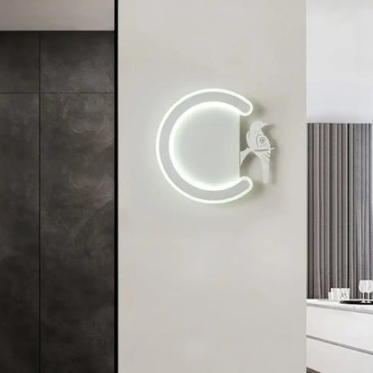 Modern gray bird wall lamp with warm white light shaped like a crescent moon for bedroom wall sconce decor