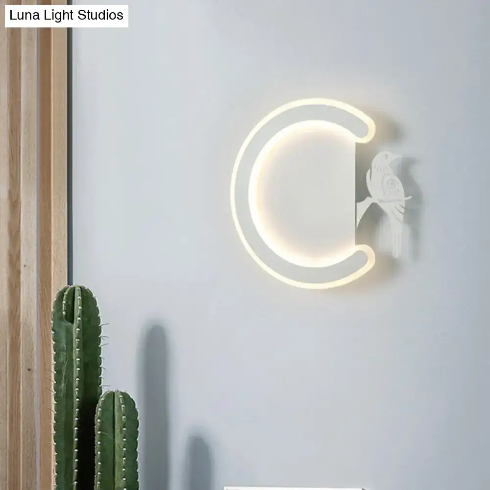 Modern gray bird wall lamp with warm white light featuring a minimalist crescent moon design for bedroom sconce