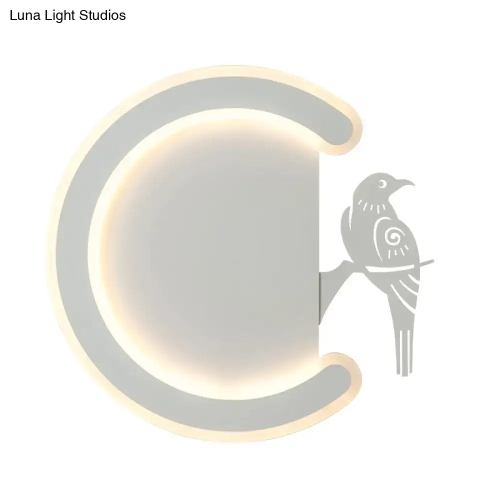 Modern gray wall lamp with a sleek curved frame and warm white light featuring a stylized bird silhouette