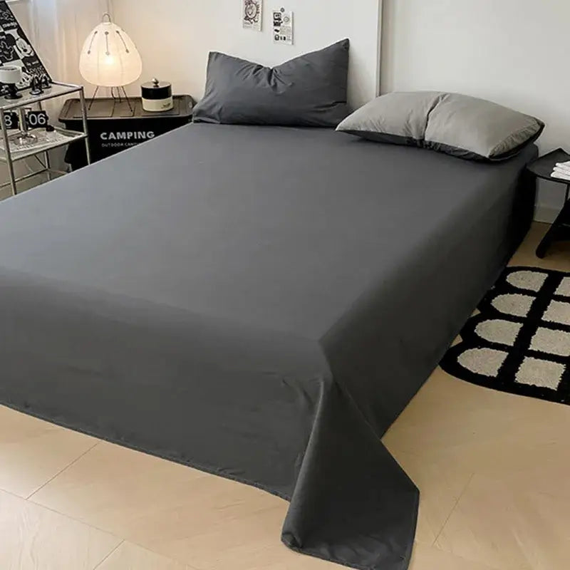 Dark gray comforter cover set with smooth slightly glossy finish featuring modern geometric throw design for bedroom bedding