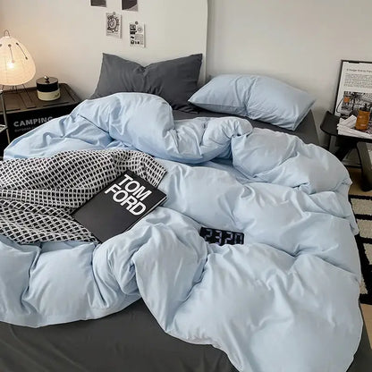 Modern gray comforter cover set featuring a light blue plush quilted duvet cover with a soft textured surface