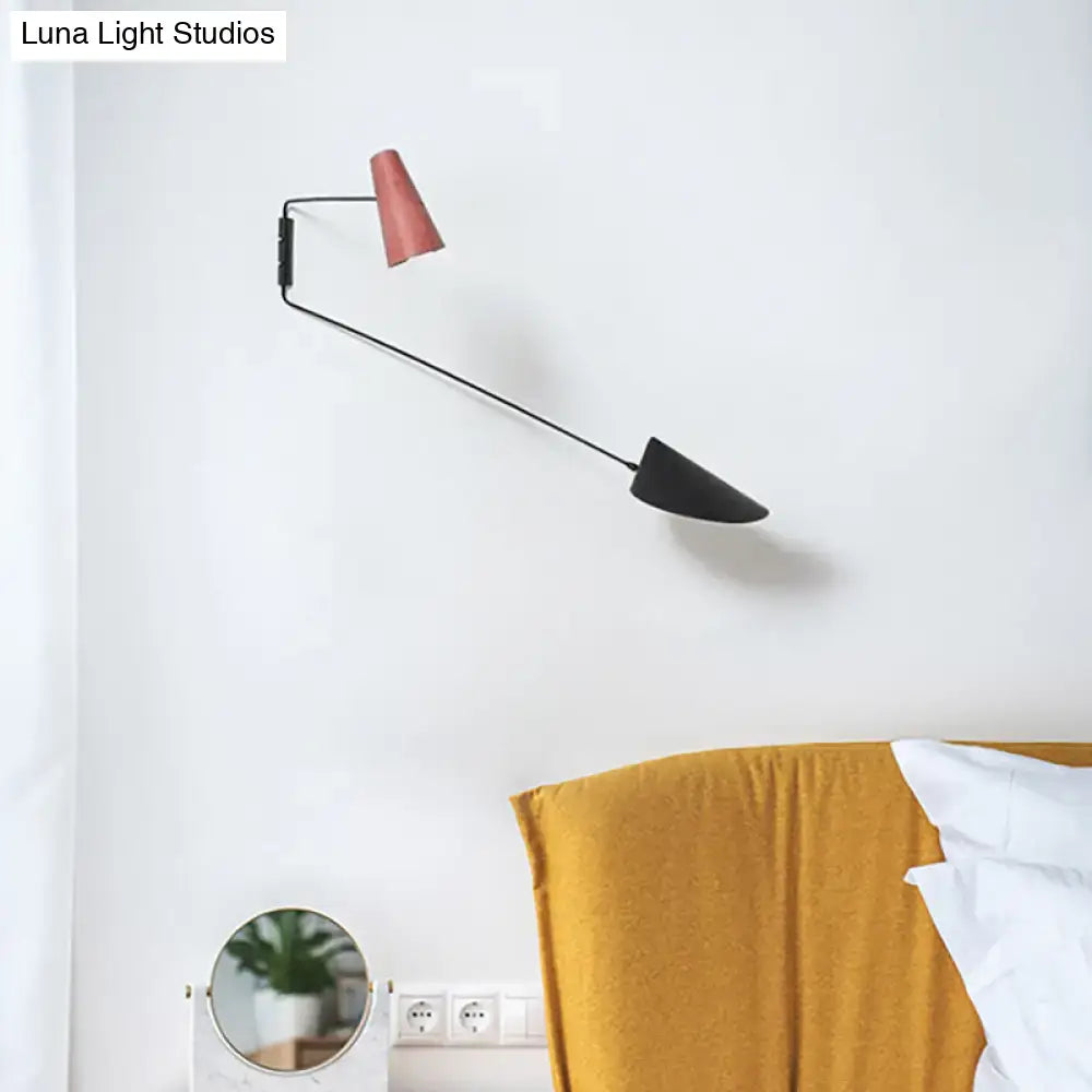 Modern gray cone duckbill wall sconce with black rod and terracotta pink and black shades for light living room use