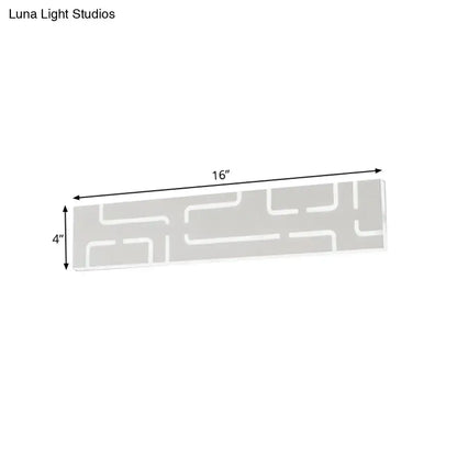 Modern gray geometric led wall sconce with warm white light and direct wired electric design for bedroom use