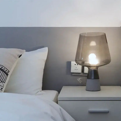 Modern gray glass and concrete table lamp with leimu amber glass shade casting warm glow for bedroom decorbites leimu amber decor