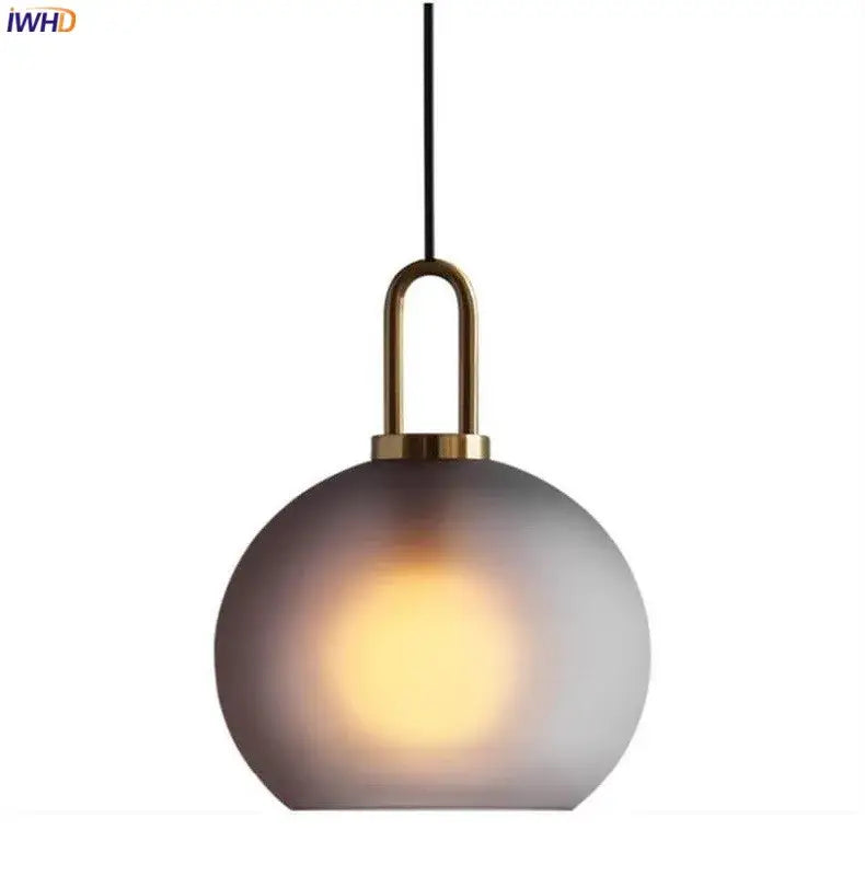 Modern gray glass ball led pendant light with frosted spherical shade and brass fixture for dining room decorbites pendant light