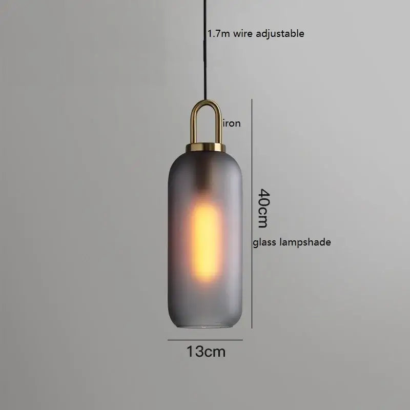 A sleek 40cm tall modern gray glass ball led pendant light with frosted shade and brass iron decorbites glass ball hardware