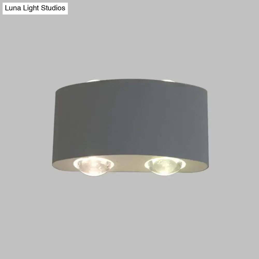 Modern gray metal piece cylindrical sconce lighting with two recessed led bulbs for living room use