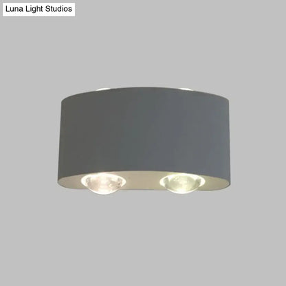 Modern gray metal piece cylindrical sconce lighting with two recessed led bulbs for living room use