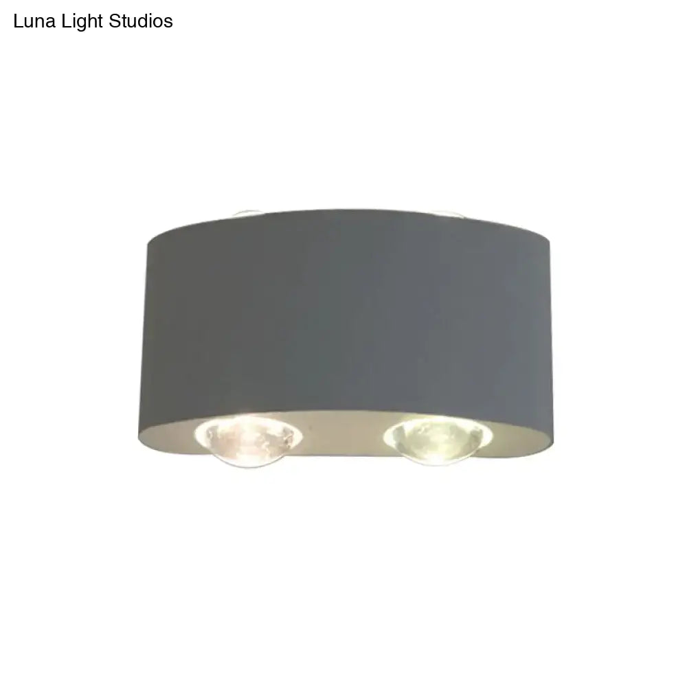Modern gray metal piece cylindrical sconce lighting with two recessed led bulbs for living room ceiling use