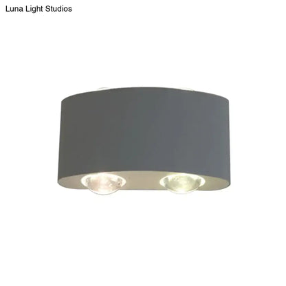 Modern gray metal piece cylindrical sconce lighting with two recessed led bulbs for living room ceiling use