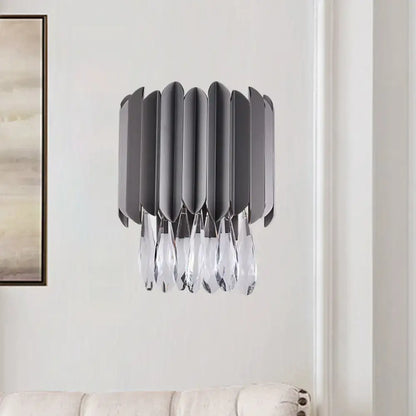Modern gray metallic wall sconce with cascading crystal teardrop droplets for bedroom lighting