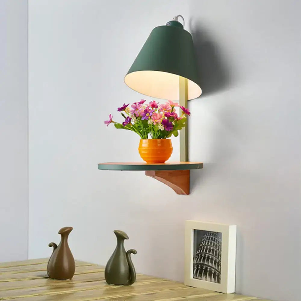 Modern gray tapered shade wall sconce with green conical lamp and wooden shelf for bedroom lighting