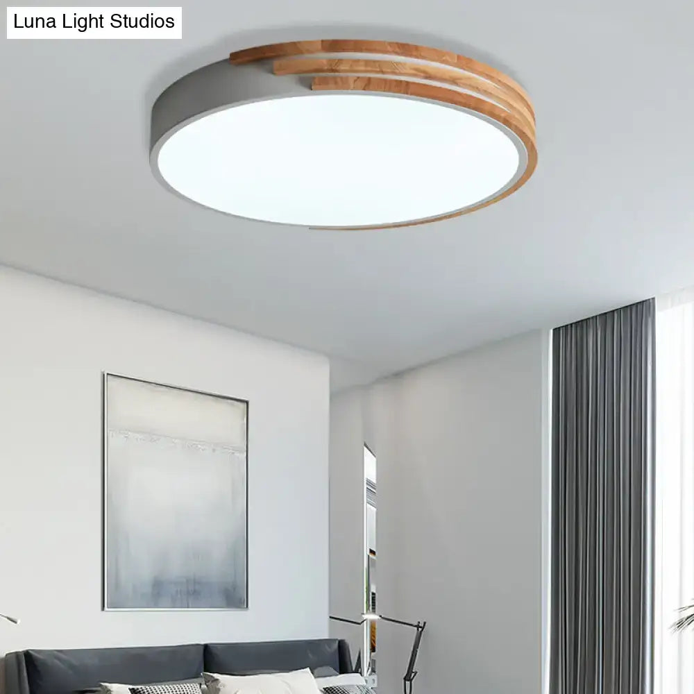 Decorbites™ nordic style round flush mount ceiling light with sleek gray base and warm wood-toned concentric rings