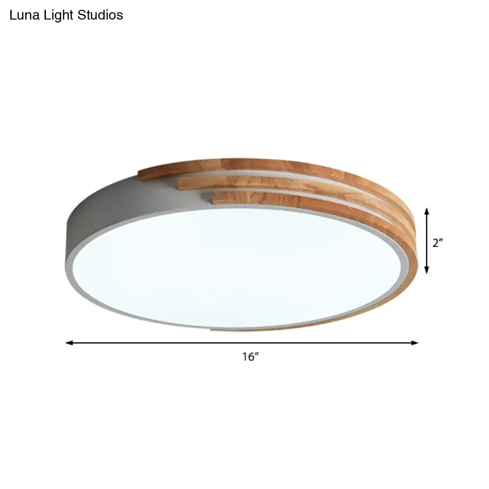 Modern decorbites nordic style round flush mount ceiling light with gray concrete base wood accents and integrated led panel