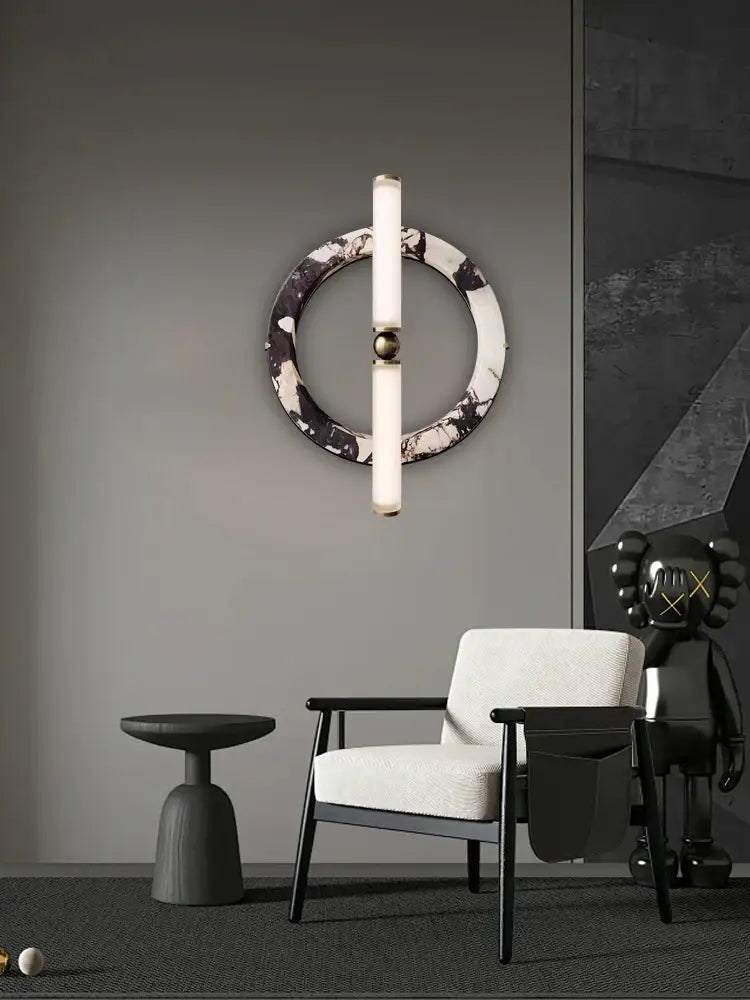 Modern wall lamp with green black marble base and two vertical frosted glass tubes for bedroom lighting