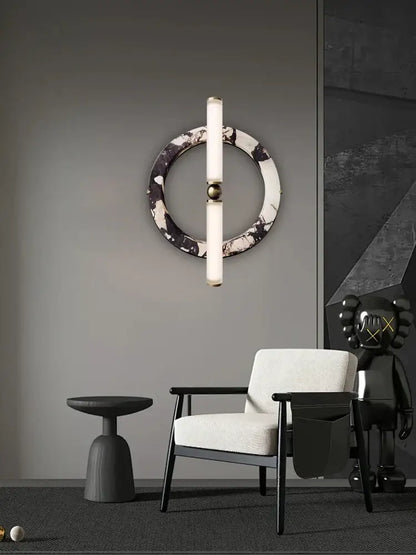 Modern wall lamp with green black marble base and two vertical frosted glass tubes for bedroom lighting