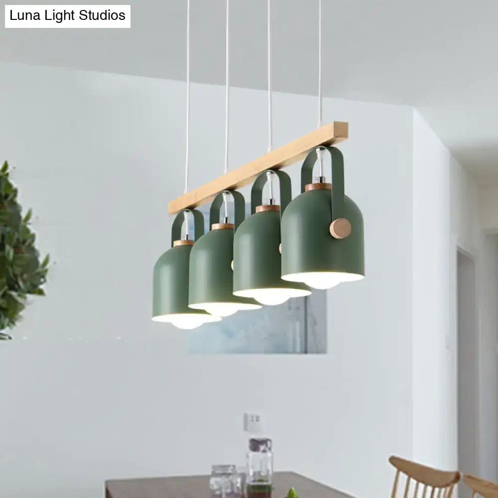 Modern green metal dome island light with wooden accents hanging from a light wood beam by DecorBites Nordic Dome Island Light