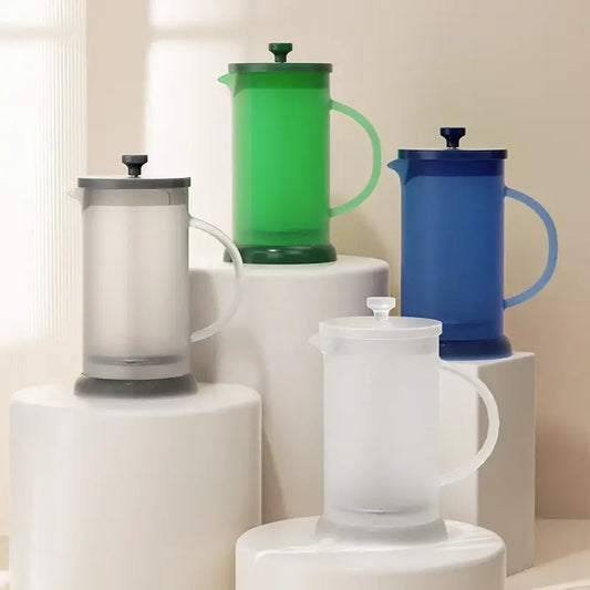 Modern green glass french press coffee maker with matching lid and handle ideal for decorbites french press use