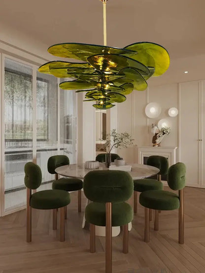 Modern green leaf glass chandelier featuring emerald-green layered petals with gold-toned central rod for dining room