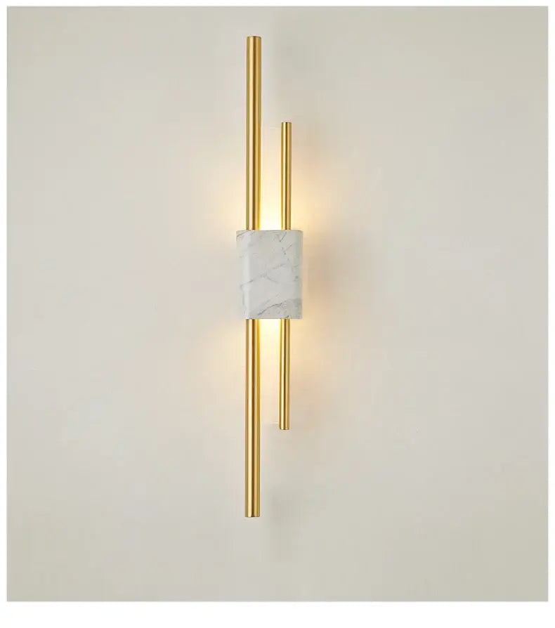 Modern gold-toned wall lamp with central white marble accent and two vertical rods for decorbites light luxury decor
