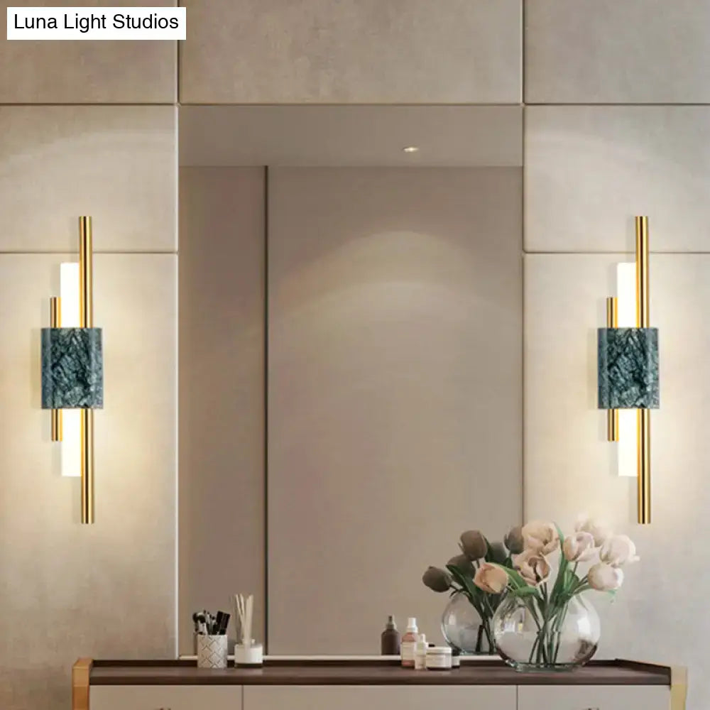 Modern green marble and gold wall sconce light featuring teal marble inlays and vertical led stick light bars for bedroom decor