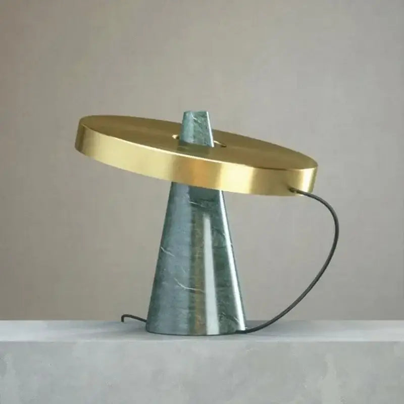 Modern green marble table lamp with a polished brass shade designed for elegant decorbites green marble living room decor