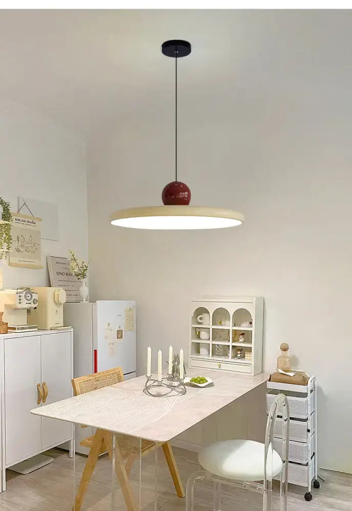 Modern green and red colorful metal led pendant light with a sleek white shade and glossy red accent for kitchen decorbites lighting