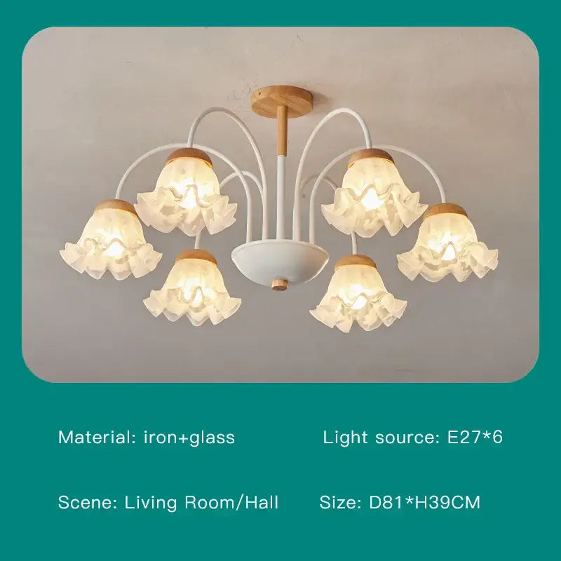 Modern green white chandelier with white and light wood-toned floral design and 8 glass globes for living room light