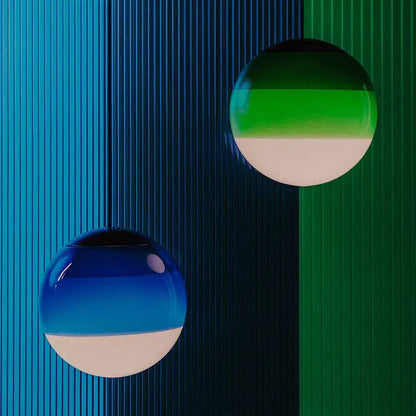 Two spherical decorbites glass ball led pendant lights with blue-to-white and green-to-white shades for dining room lighting