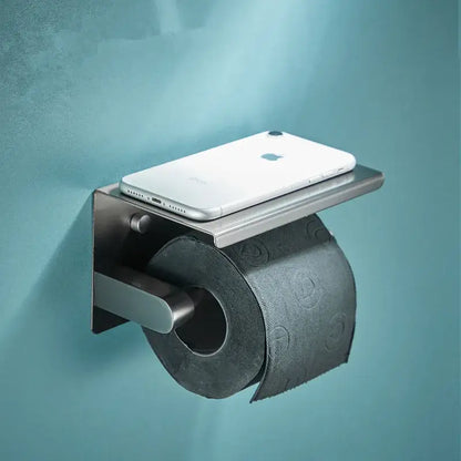 Modern grey bathroom accessories set featuring a brushed stainless steel toilet paper holder with integrated shelf holding iphone