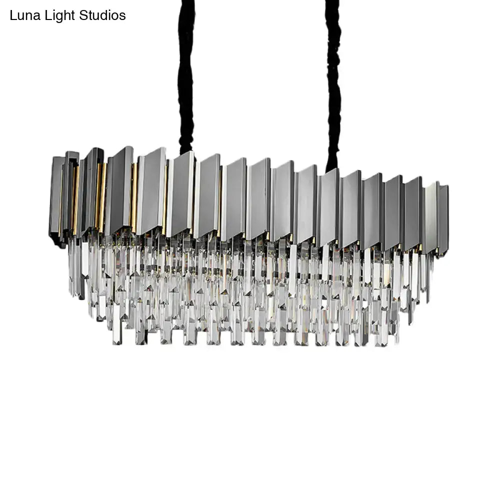 Modern grey crystal pendant chandelier with sleek metallic frame and cascading prisms for kitchen island lighting