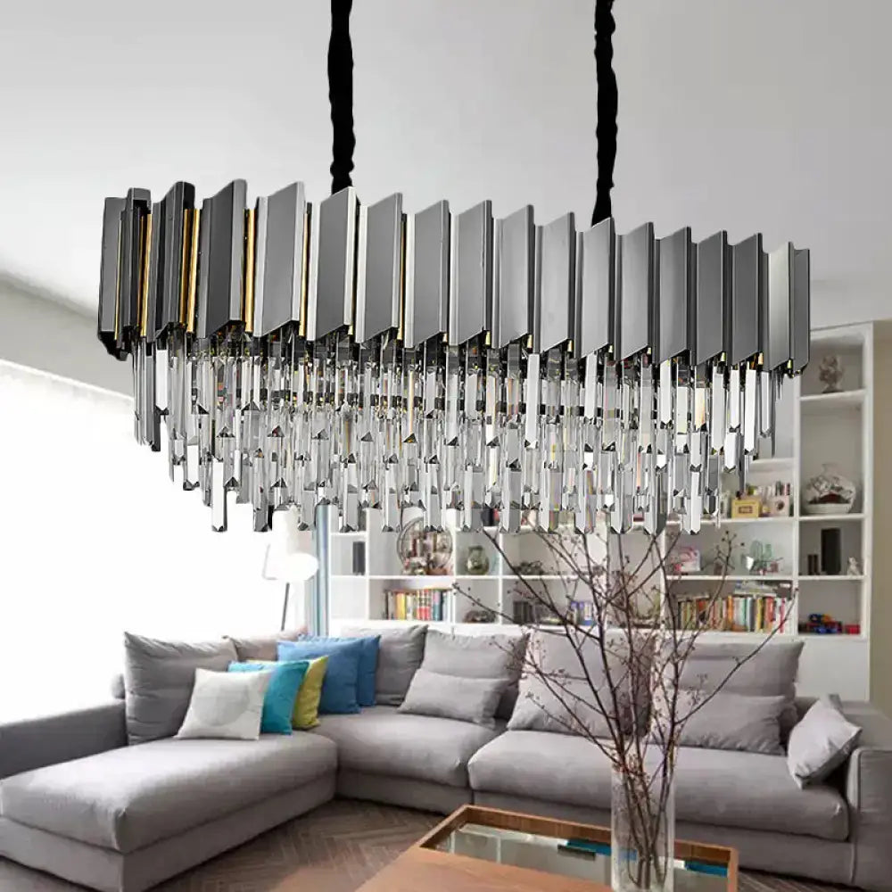 Modern grey crystal pendant chandelier with sleek metallic frame and cascading prisms for kitchen island lighting