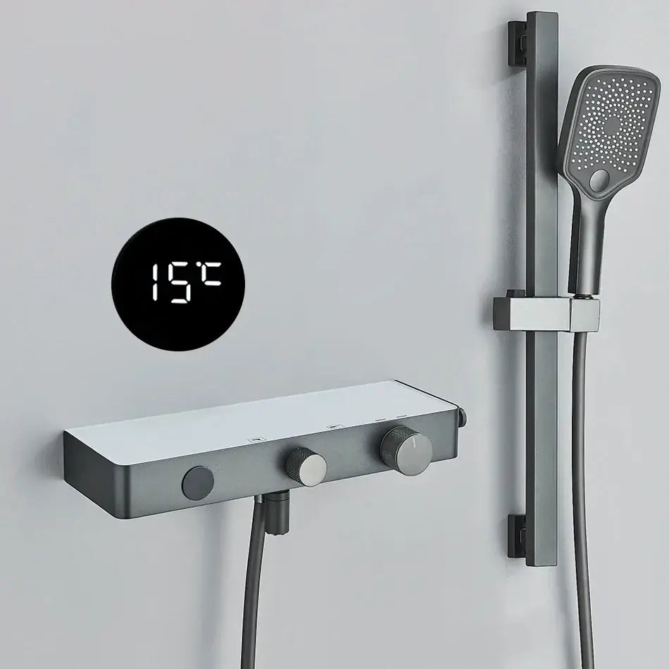 Modern grey digital shower faucet set with shelf featuring a matte black and silver digital shower faucet displaying 15°c