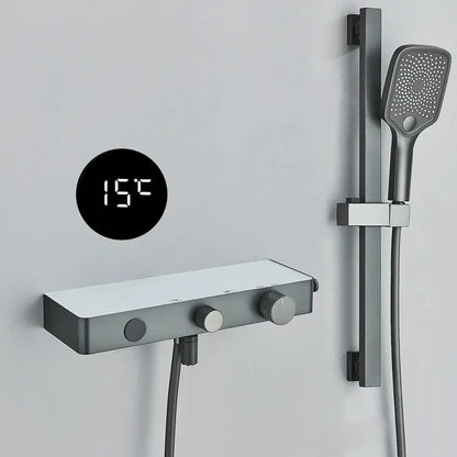 Modern grey digital shower faucet set with shelf featuring a matte black and silver digital shower faucet displaying 15°c