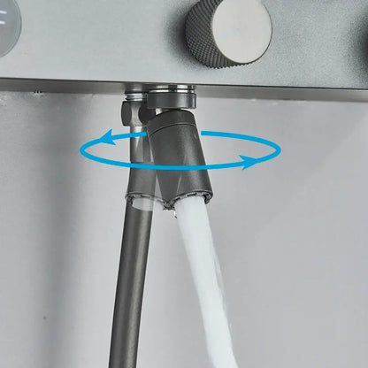 A sleek matte black rotating spray nozzle with textured knob on a modern grey digital shower faucet set for bathroom