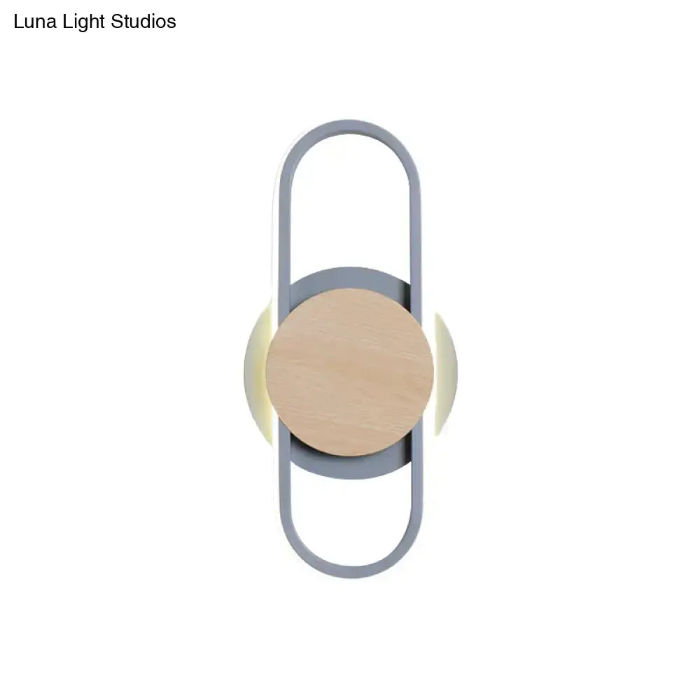 Modern grey and light wood led wall sconce with sleek metal frame natural wood accent and warm bedroom ring light