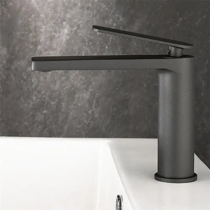 Modern gun gray basin faucet with matte black finish and tall cylindrical base for bathroom sink decorbites gun gray design