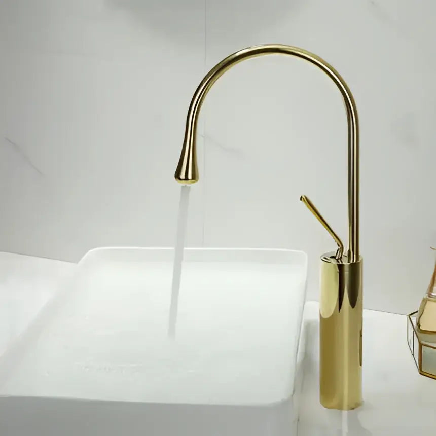 Gold-toned modern gun grey brass basin faucet with curved spout and cylindrical base for kitchen decorbites gun grey use