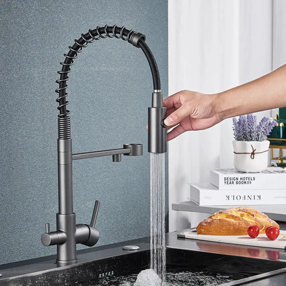 Modern gun grey filter kitchen faucet with pull down spring spout features a matte black flexible coiled hose design decorbites gun grey