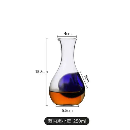 Clear glass wine decanter with blue and amber liquid and 250ml markings from decorbites crystal glass set