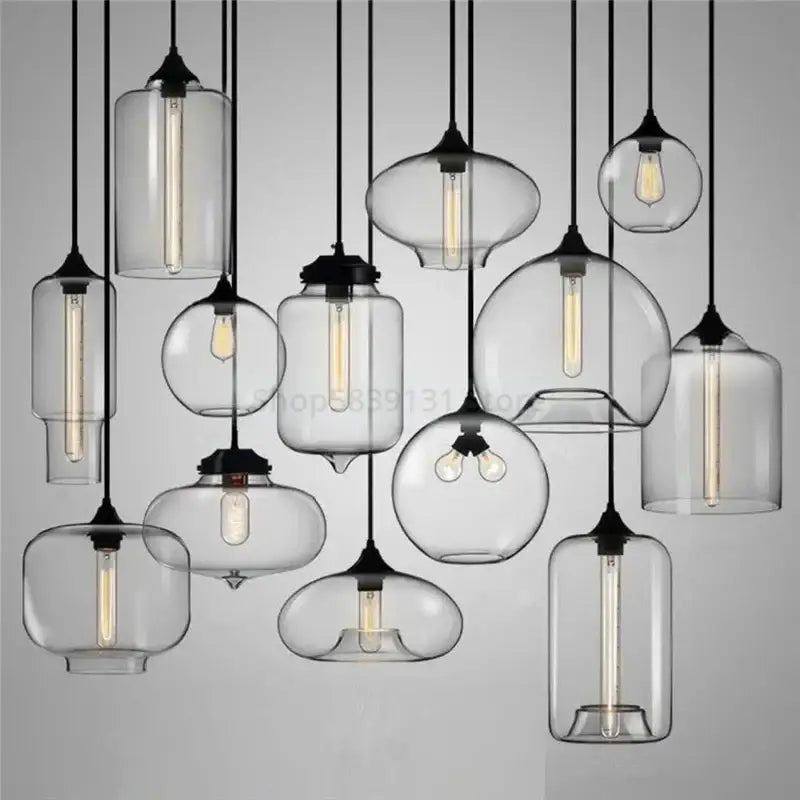 Clear glass pendant lights with black metal fixtures and exposed filament bulbs for decorbites colorful stained glass decor
