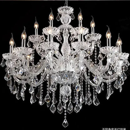 Modern hand blown crystal chandelier light with intricate glass arms and teardrop crystals for dining room use