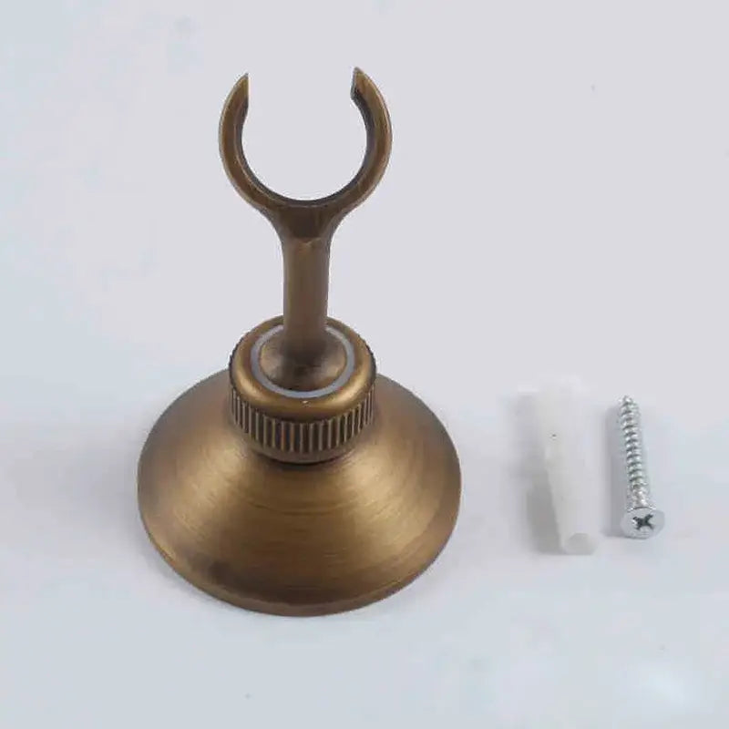 Antique brass-colored metal decorbites handshower bracket wall mounted holder with circular base and curved hook