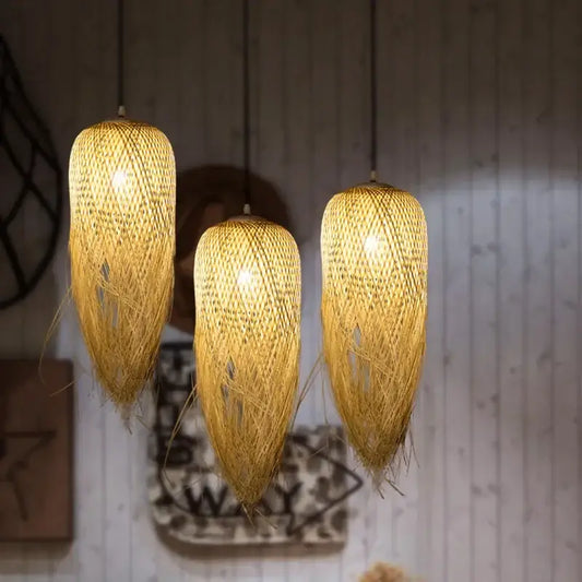 Three warm-toned modern handwoven bamboo pendant lights perfect for dining room decorbites bamboo pendant lights